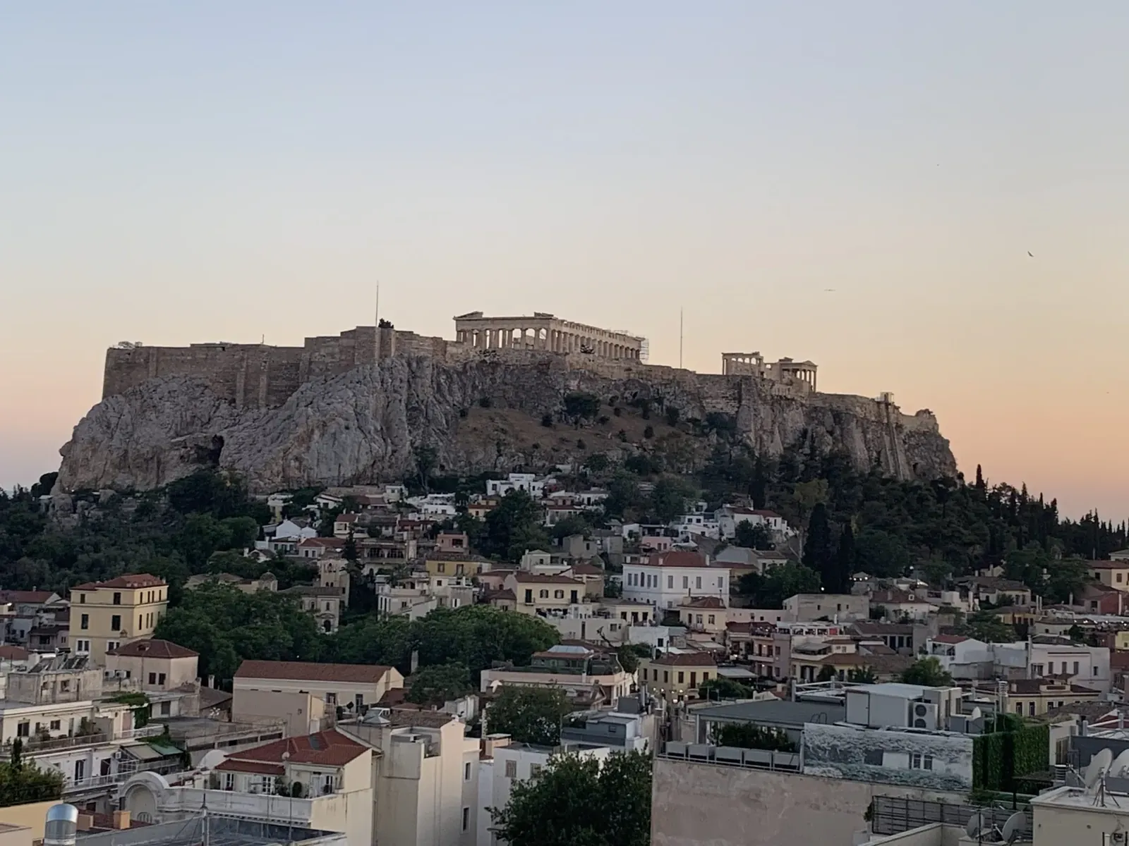 Greek city skyline at dusk