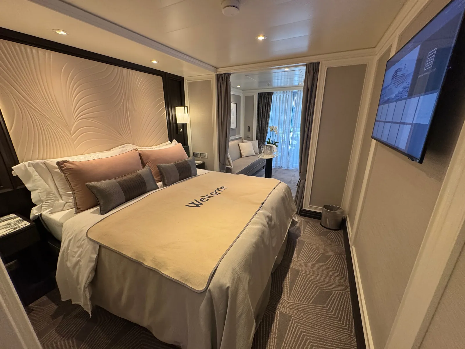 Regent suite with turndown welcome blanket and balcony view