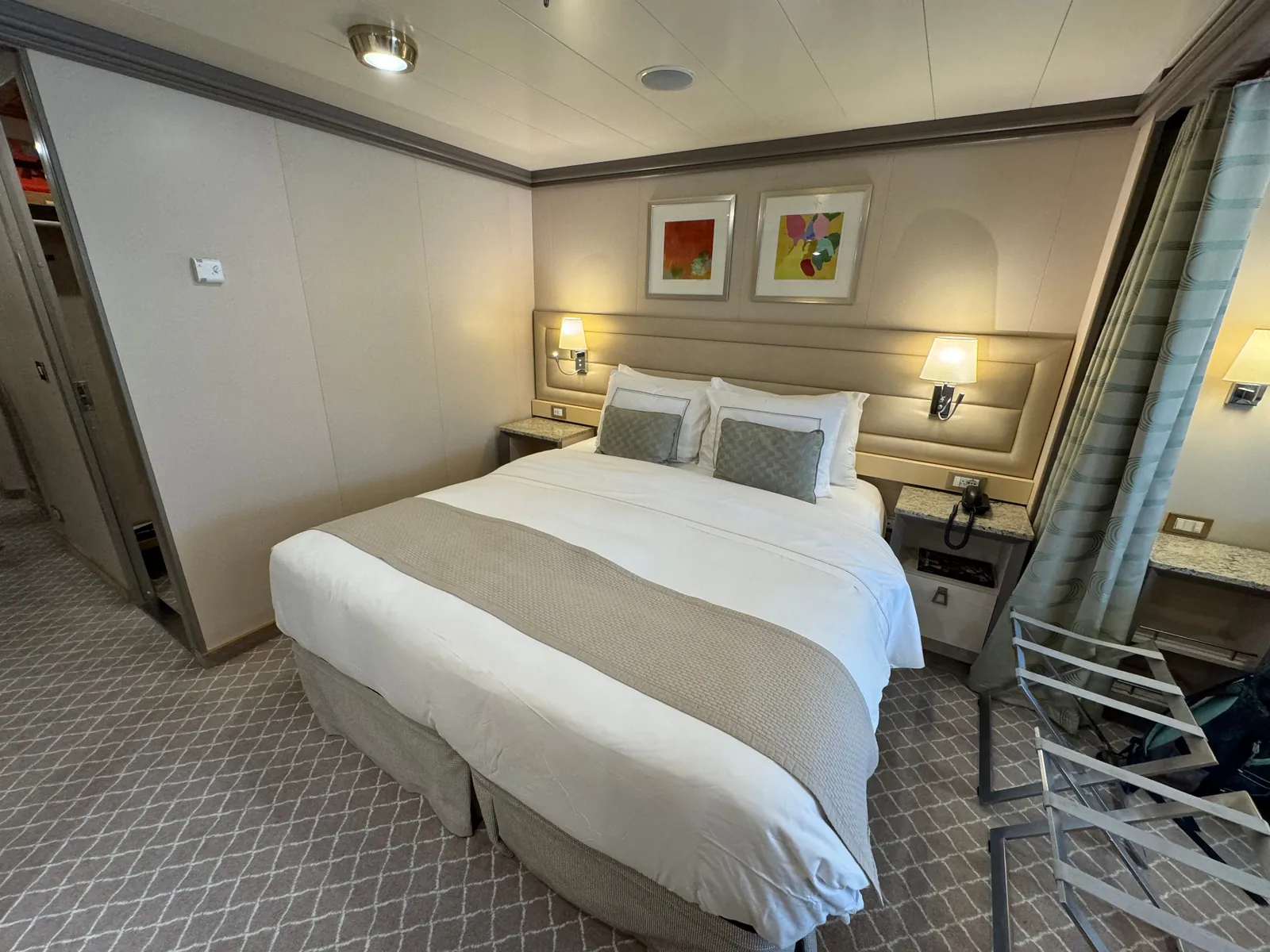 King bed in a Silversea Deluxe Veranda Suite