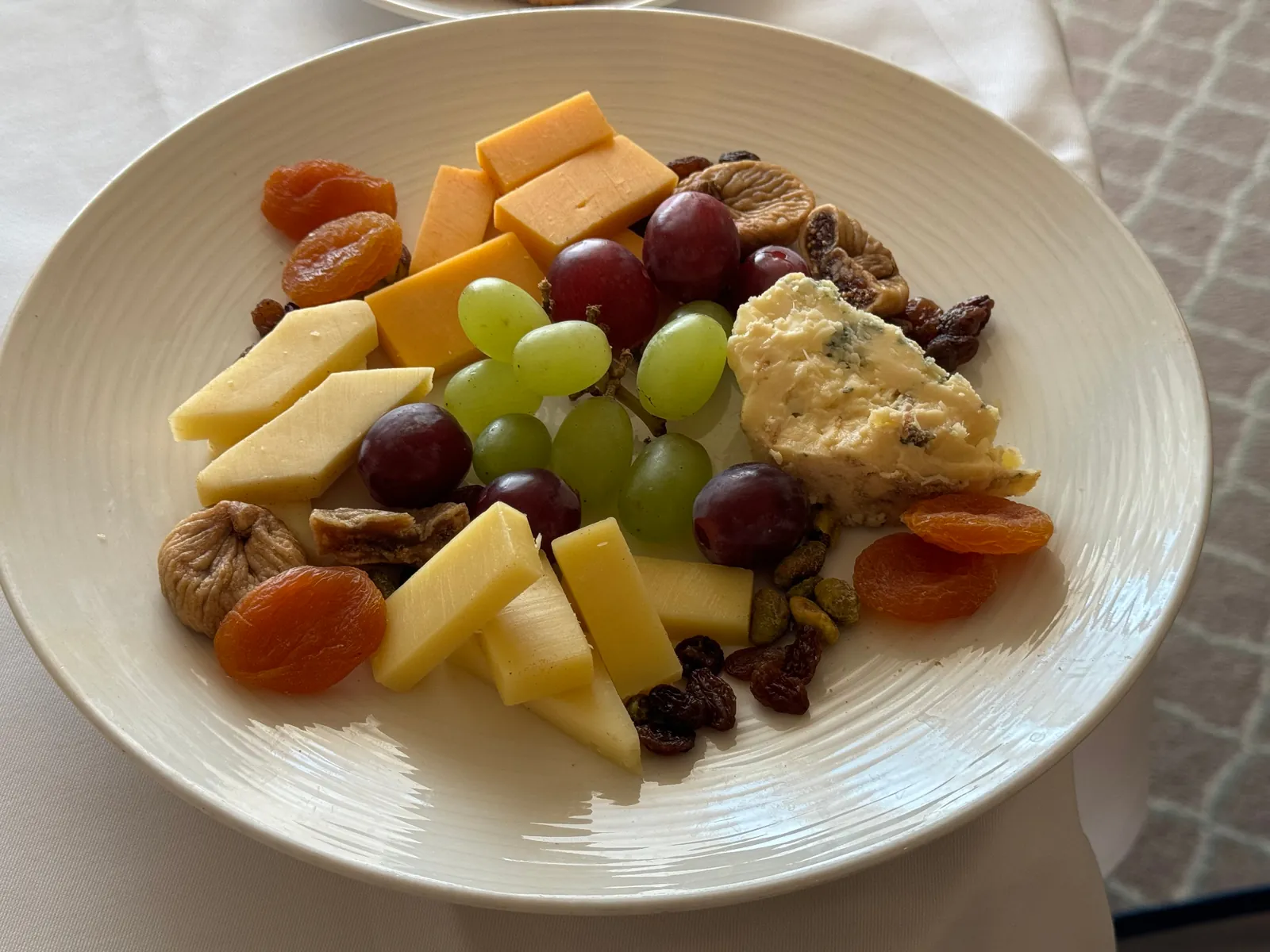 Afternoon cheese and fruit plate delivered to the suite